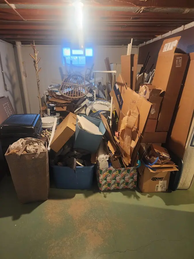 Roll-off dumpster container at job site for 2 Yard Dumpster Rental in McCandless